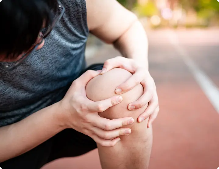 A patient discussing ACL reconstruction surgery with a specialist