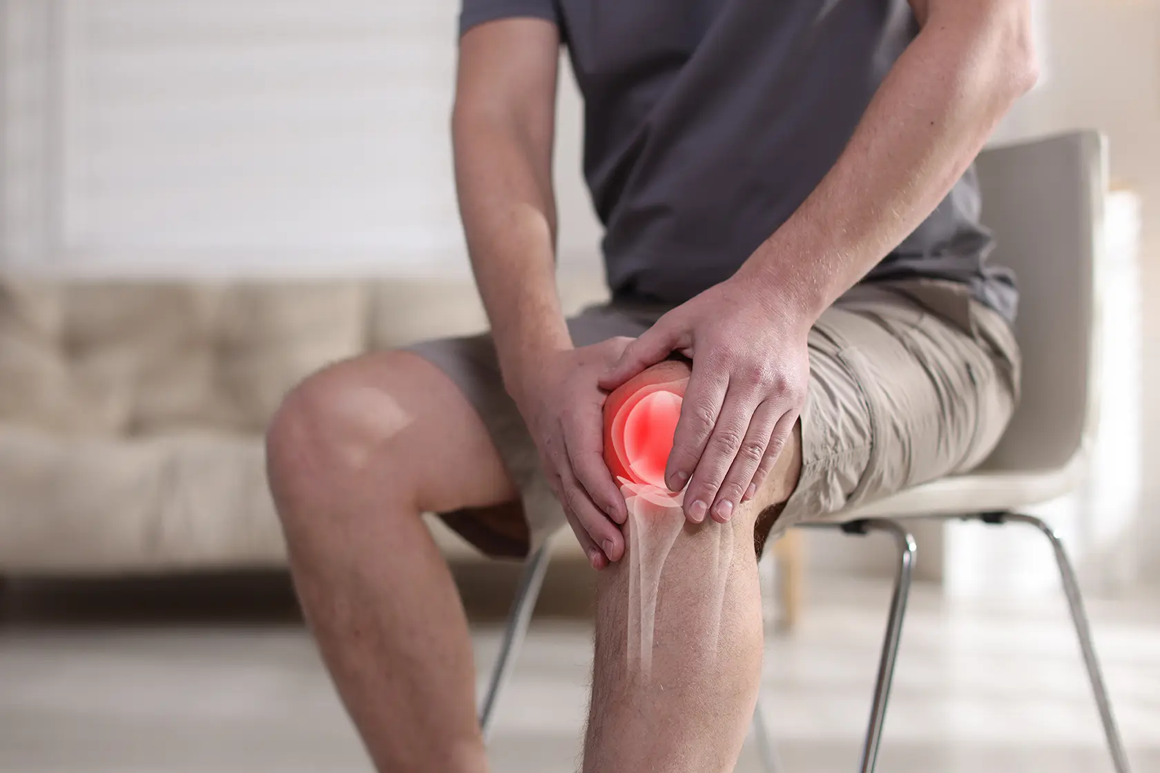A man suffering from knee pain.