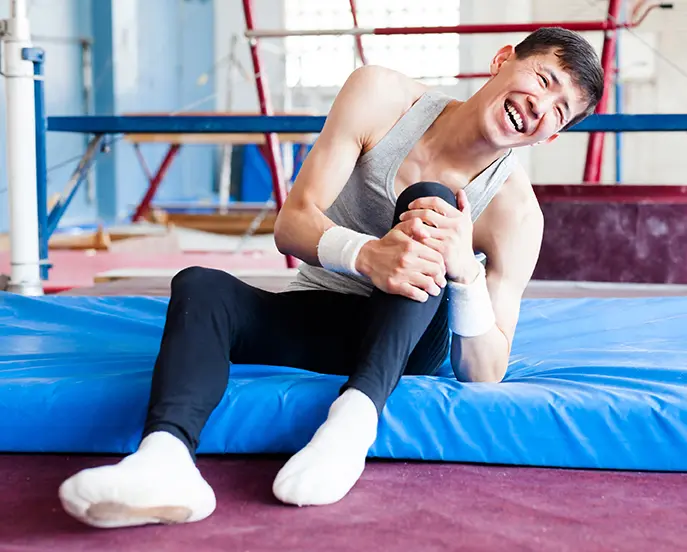 A man experiencing a tendon tear.