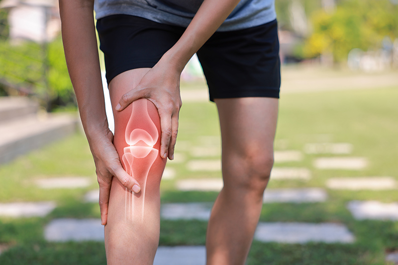 A man suffering from a severe knee injury
